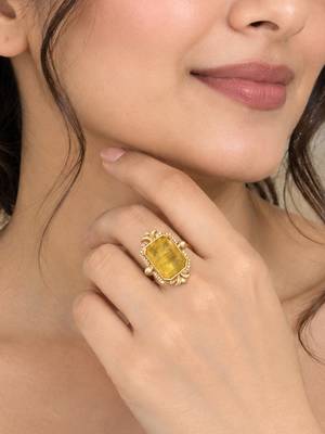 Elegant golden yellow gemstone statement ring with clear stone border 3