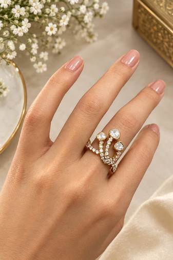 Elegant gold tone crown design statement ring with clear stone accents