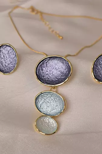 Blue pendant necklace set with matching earrings for women
