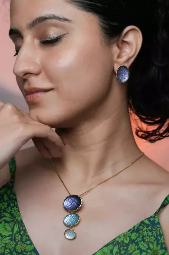 Blue pendant necklace set with matching earrings for women