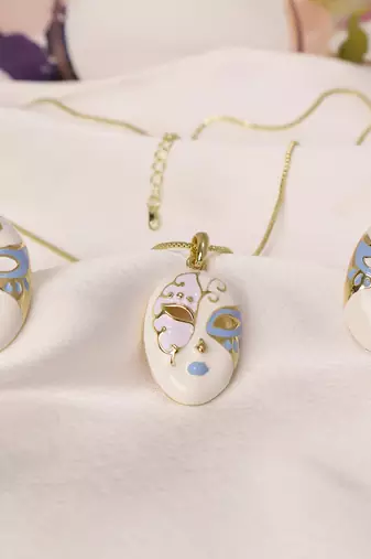 White & blue enamel venetian mask pendant necklace set with matching earrings