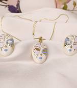 White & blue enamel venetian mask pendant necklace set with matching earrings