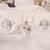 White & blue enamel venetian mask pendant necklace set with matching earrings