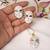White & blue enamel venetian mask pendant necklace set with matching earrings