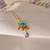 Enamel daisy flower pendant necklace with purple crystal drop | anti-tarnish gold plated