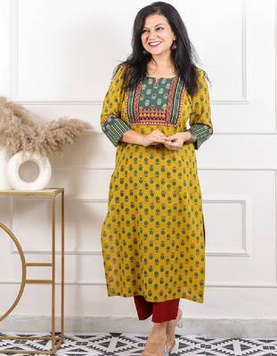 Women yellow mirror work printed ajrak patch cotton kurti 1