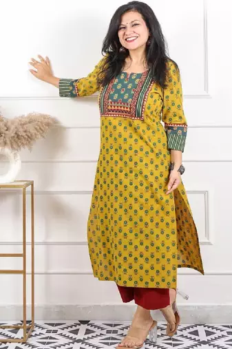 Women yellow mirror work printed ajrak patch cotton kurti