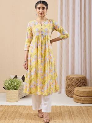 Women yellow pure cotton floral printed a-line kurta 1