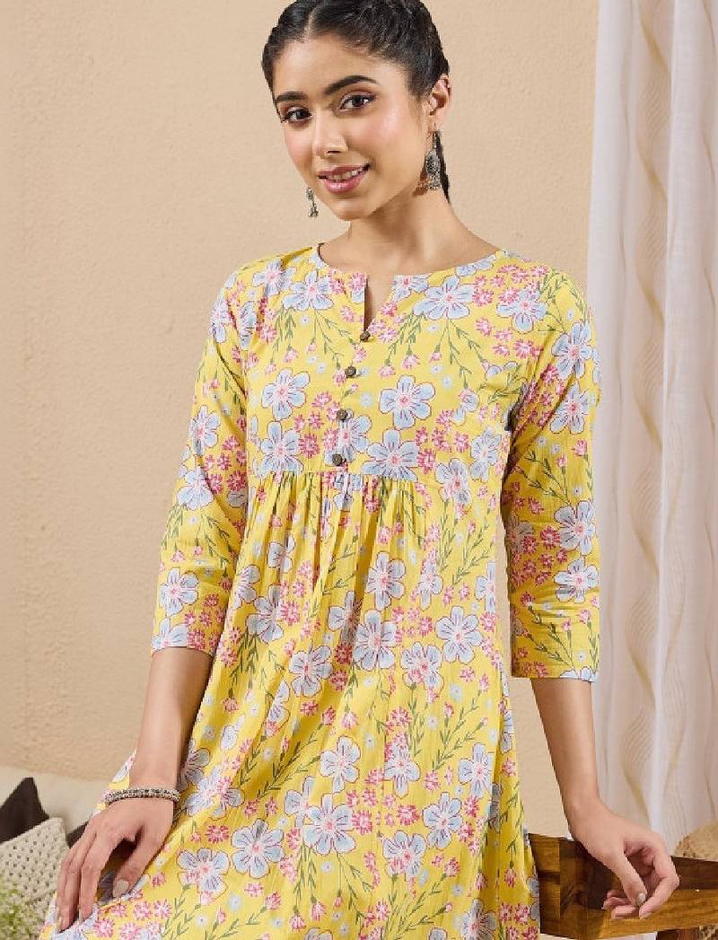 Women yellow pure cotton floral printed a-line kurta