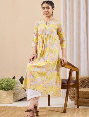 Women yellow pure cotton floral printed a-line kurta 3