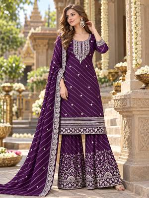 Purple georgette semi stitched suit with embroidery & zari work 1