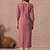 Women straight fit cotton kurta with cordwork floral embroidery on yoke sleeves.