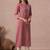 Women straight fit cotton kurta with cordwork floral embroidery on yoke sleeves.