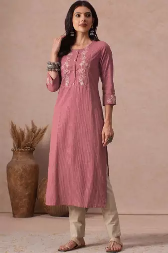 Women straight fit cotton kurta with cordwork floral embroidery on yoke sleeves.