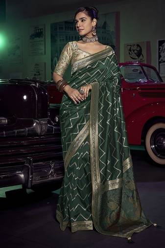 dark green viscose silk blend with 3d weaved pallu festival wear saree