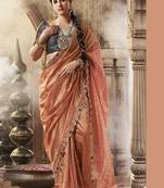 peach zari tissue lace work festive wear saree