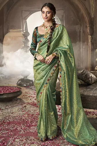 pista zari tissue lace work festive wear saree