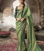 pista zari tissue lace work festive wear saree