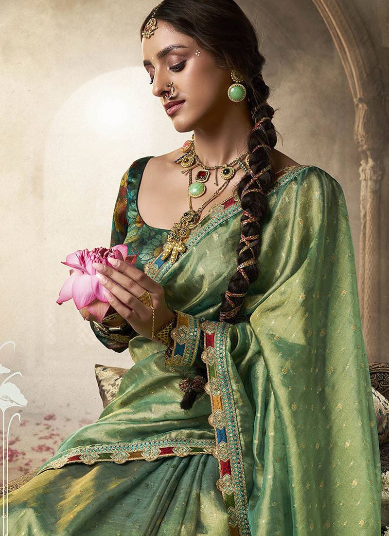 pista zari tissue lace work festive wear saree