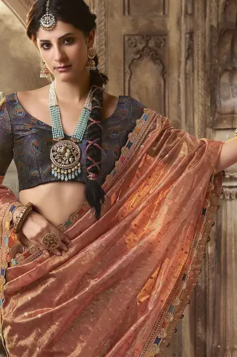 peach zari tissue lace work festive wear saree