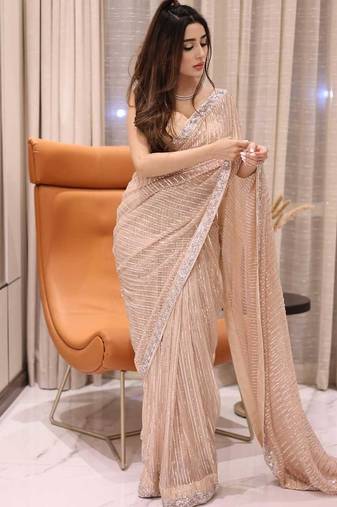 Peach party wear soft georgette sequin saree with plain blouse