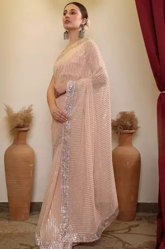 Peach party wear soft georgette sequin saree with plain blouse