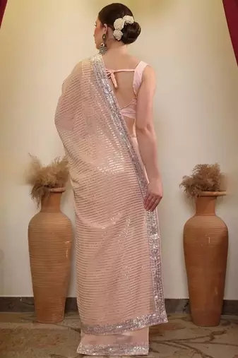 Peach party wear soft georgette sequin saree with plain blouse