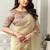 beige organza floral hand print swaroski stone work party wear saree
