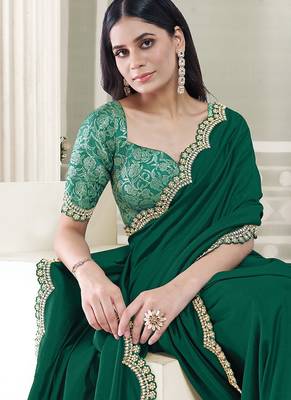 green crape embroidered border party wear saree 2