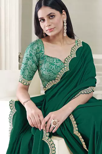 green crape embroidered border party wear saree