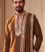 yellow kurta set with silver mirror work and an attached stole