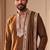 yellow kurta set with silver mirror work and an attached stole