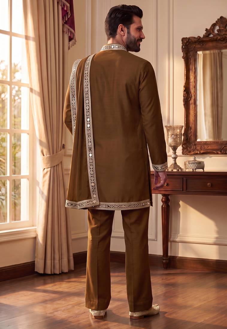 yellow kurta set with silver mirror work and an attached stole