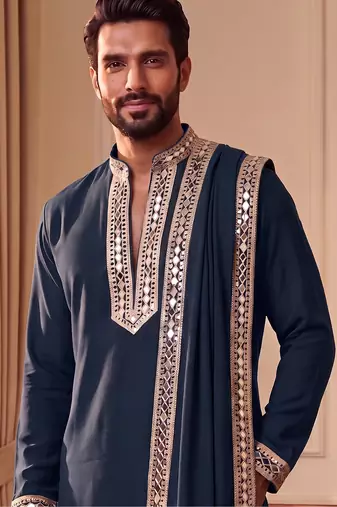 Blue lachka kurta set with silver mirror work and an attached stole.