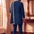 Blue lachka kurta set with silver mirror work and an attached stole.