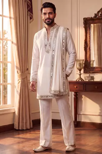 purple pure lachka kurta set with silver mirror work and an attached stole