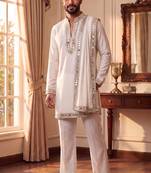 purple pure lachka kurta set with silver mirror work and an attached stole