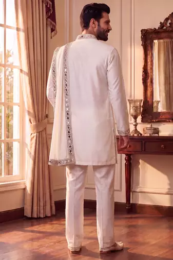 purple pure lachka kurta set with silver mirror work and an attached stole