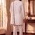 purple pure lachka kurta set with silver mirror work and an attached stole
