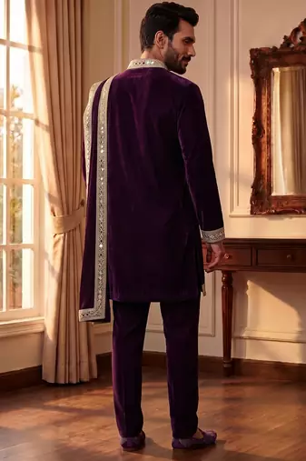 purple pure lachka kurta set with silver mirror work and an attached stole.