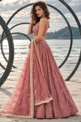 DUSTY PINK NET THREAD WITH ZARI AND SEQUIN WORK FESTIVE LEHENGA CHOLI