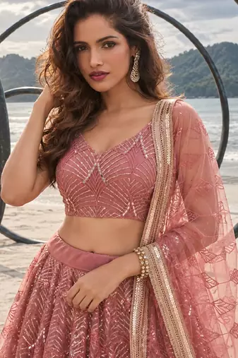 DUSTY PINK NET THREAD WITH ZARI AND SEQUIN WORK FESTIVE LEHENGA CHOLI