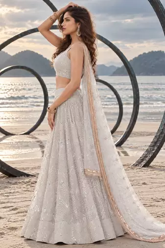 WHITE NET THREAD WITH ZARI AND SEQUINCE WORK FESTIVE LEHENGA CHOLI SET FOR WOMEN'S
