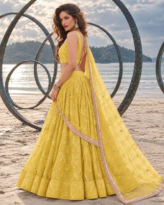 YELLOW NET THREAD WITH ZARI AND SEQUINCE WORK FESTIVE LEHENGA CHOLI SET FOR WOMEN'S 3