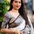 White black silk blend jacuard work festival saree with unstitched blouse piece