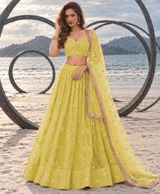 LIGHT YELLOW NET THREAD WITH ZARI AND SEQUINCE WORK FESTIVE LEHENGA CHOLI SET FOR WOMEN'S 1