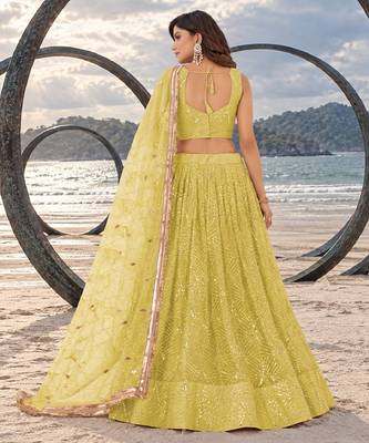 LIGHT YELLOW NET THREAD WITH ZARI AND SEQUINCE WORK FESTIVE LEHENGA CHOLI SET FOR WOMEN'S 2