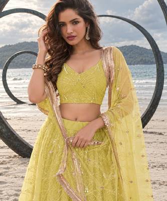 LIGHT YELLOW NET THREAD WITH ZARI AND SEQUINCE WORK FESTIVE LEHENGA CHOLI SET FOR WOMEN'S 5