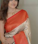 White orange silk blend jacuard work festival saree with unstitched blouse piece