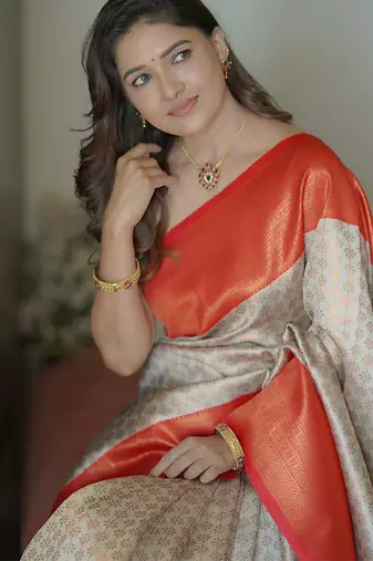 White orange silk blend jacuard work festival saree with unstitched blouse piece